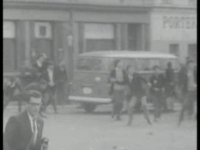 Young_Men_Throw_Rocks_During_a_Belfast_Riot_ca__1970