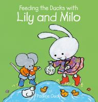 Feeding_the_ducks_with_Lily_and_Milo